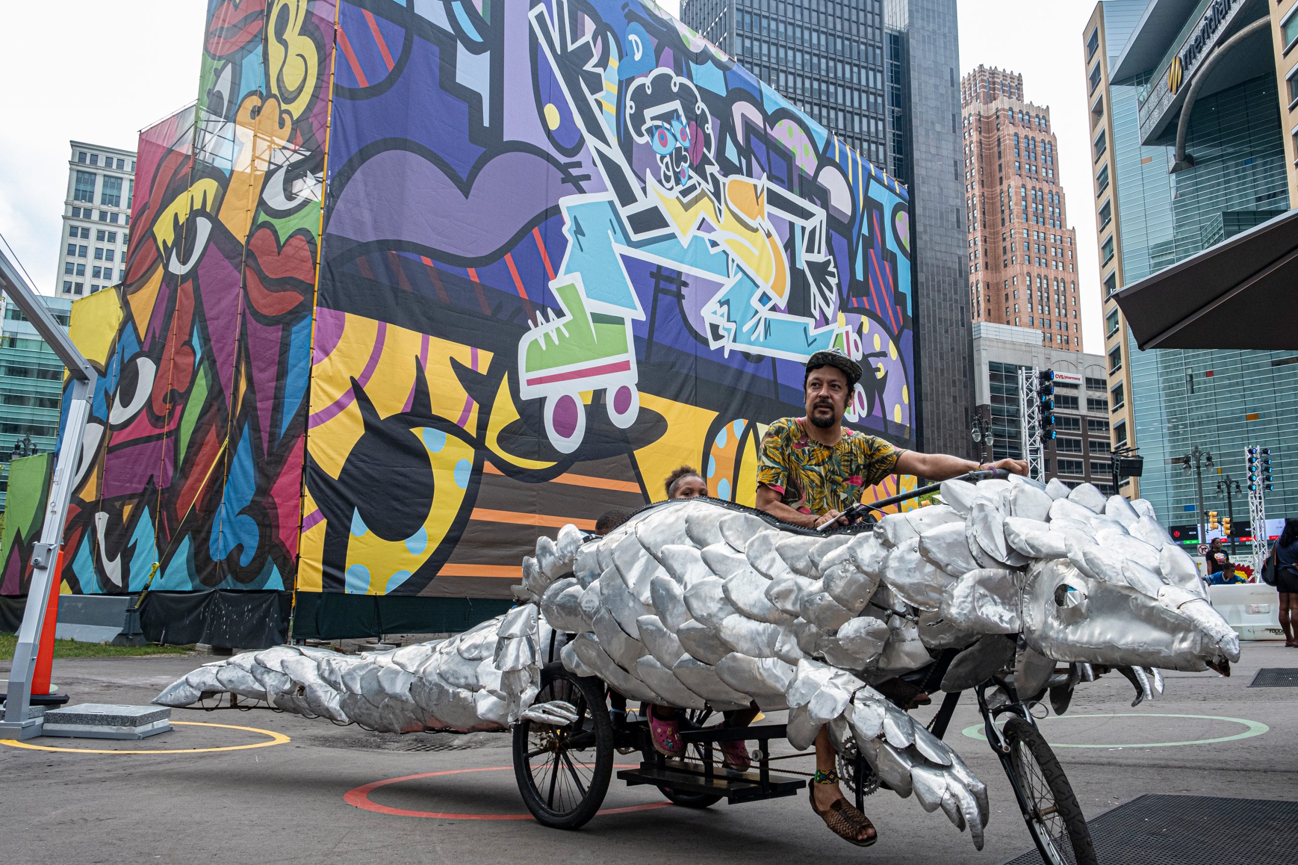 Juan Martinez riding his pangolin bike sculpture