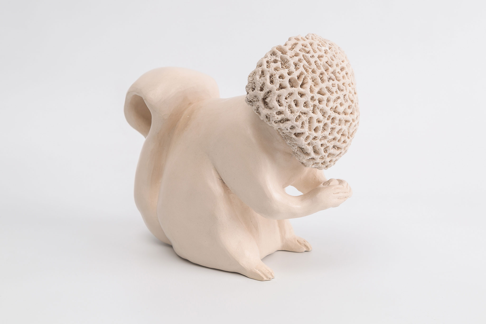 Burnished Clay, and Coral Where the Head Should Be